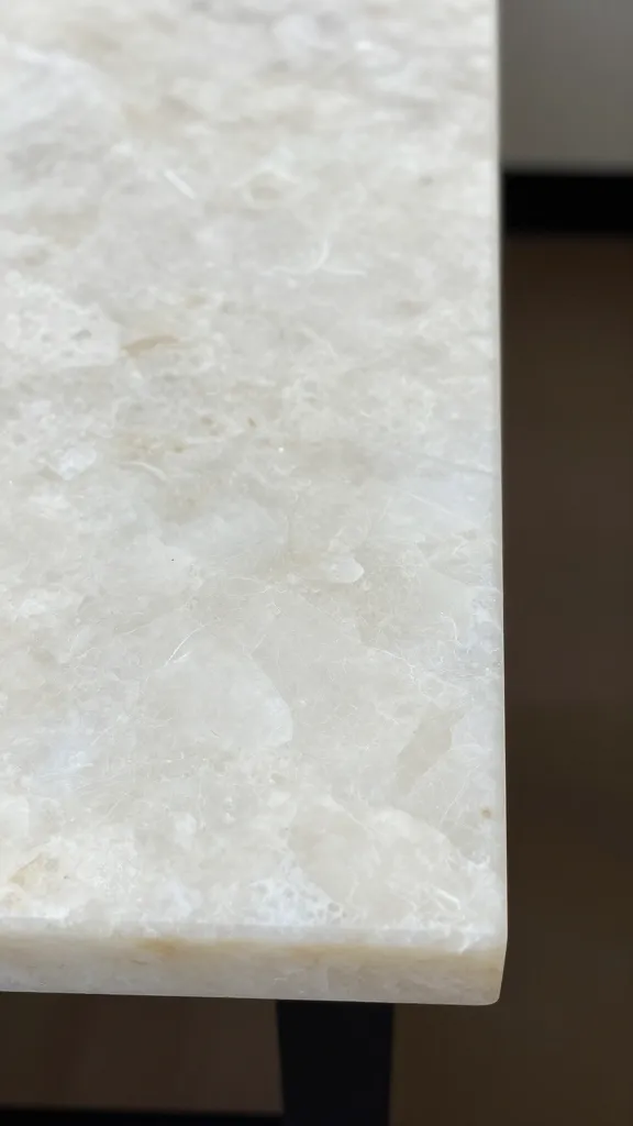 quartz tabletop corner with beveled edge, natural light